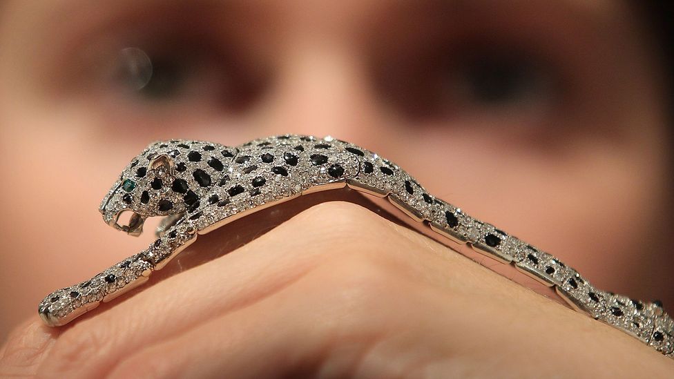 Wallis Simpson's bespoke, 1952 onyx-and-diamond-embellished Panther bracelet by Cartier was the star piece of a 2010 Sotheby's auction (Credit: Getty Images)