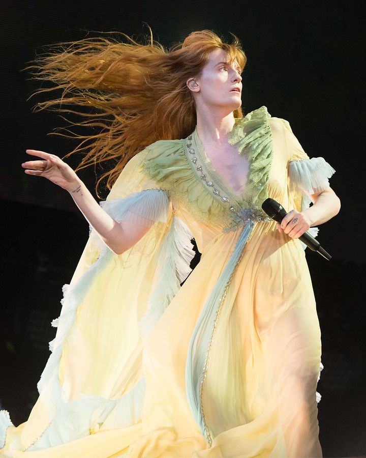 UK artist Florence Welch has been influenced by the 70s rock-goddess look, with her romantic, floaty dresses and long, loose hair (Credit: Getty Images)