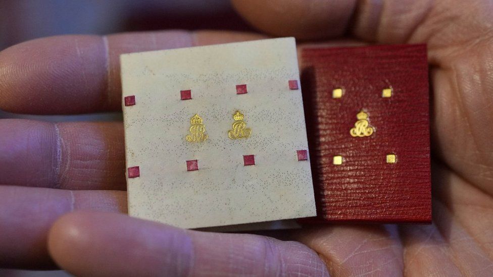 The exterior of the tiny book written by the Queen.