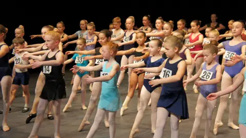 Ben Garner Auditionees in a ballet pose