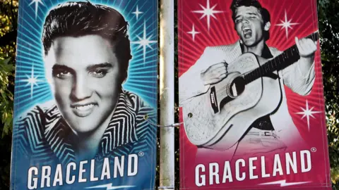 Getty Images Banners showing Elvis Presley's face outside Graceland