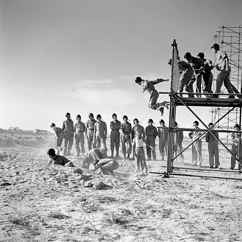 Alamy The idea of creating fake formations as a deception was pioneered in Cairo by Clarke's A-Force (pictured: Special Air Service volunteers training in Egypt) (Credit: Alamy)