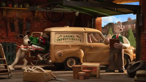 Gromit loading equipment into a van reading 'Gnome Improvements, with Wallace holding a clipboard