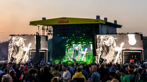 Getty Images Thousands of music fans in front of the main stage at Leeds Festival