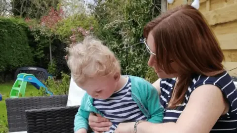 O'Leary Hall family Rose O'Leary Hall reading with her mum Sue