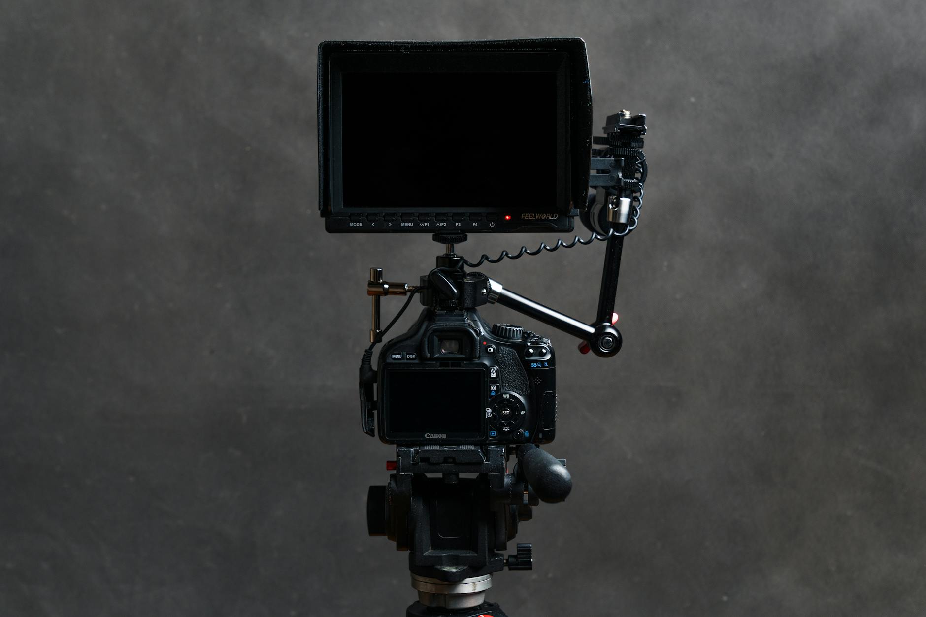 Professional video recording setup with camera, lighting equipment, and microphone for content creation