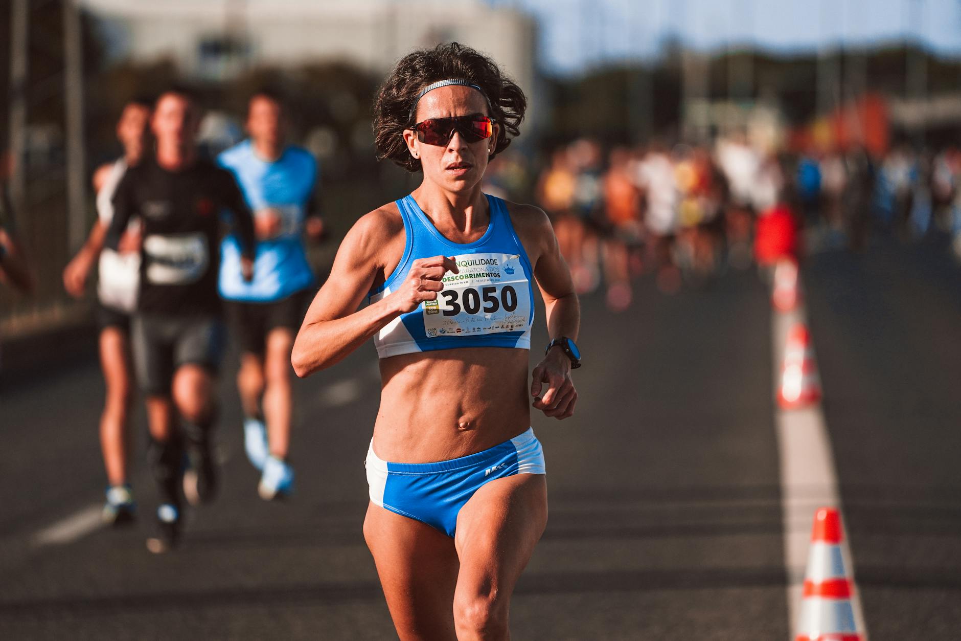 Close-up of runner's wrist wearing a smartwatch during outdoor exercise