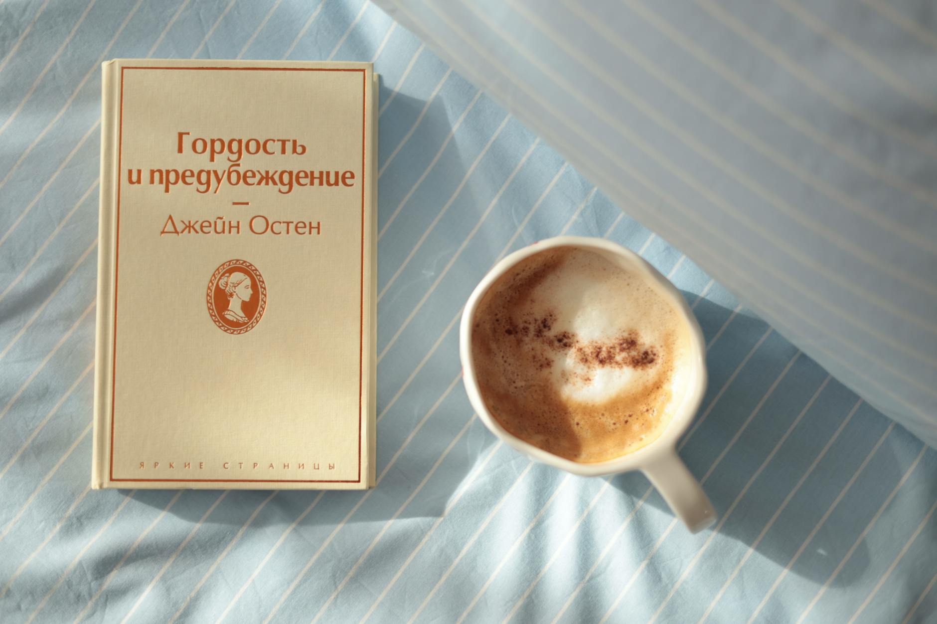 Close-up of minimalist geometric jewelry pieces with clean lines and metallic finishes