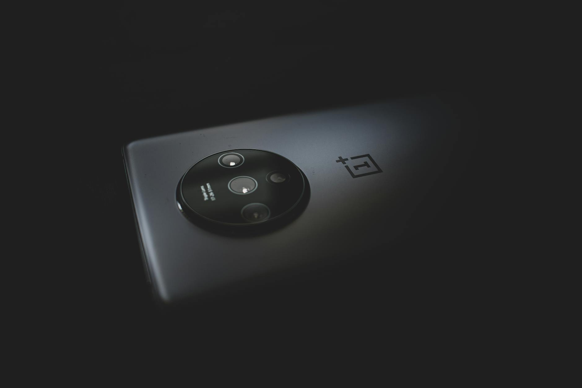 Close-up view of modern smartphone camera system with multiple lenses