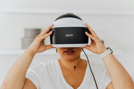 Person wearing virtual reality headset in modern setting