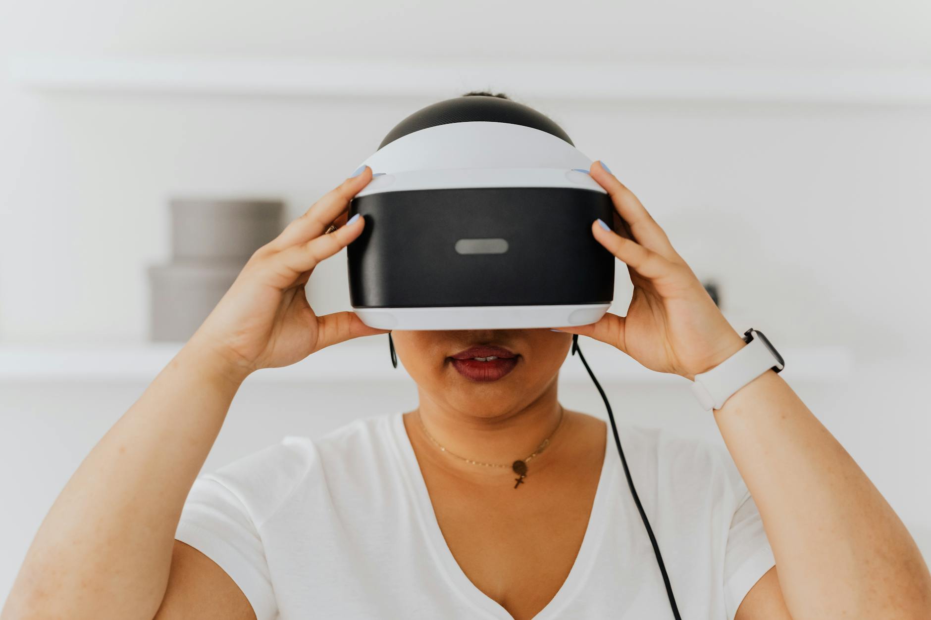 Person wearing virtual reality headset in modern setting