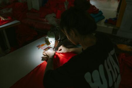 Industrial sewing machines in a fashion trade school workshop classroom