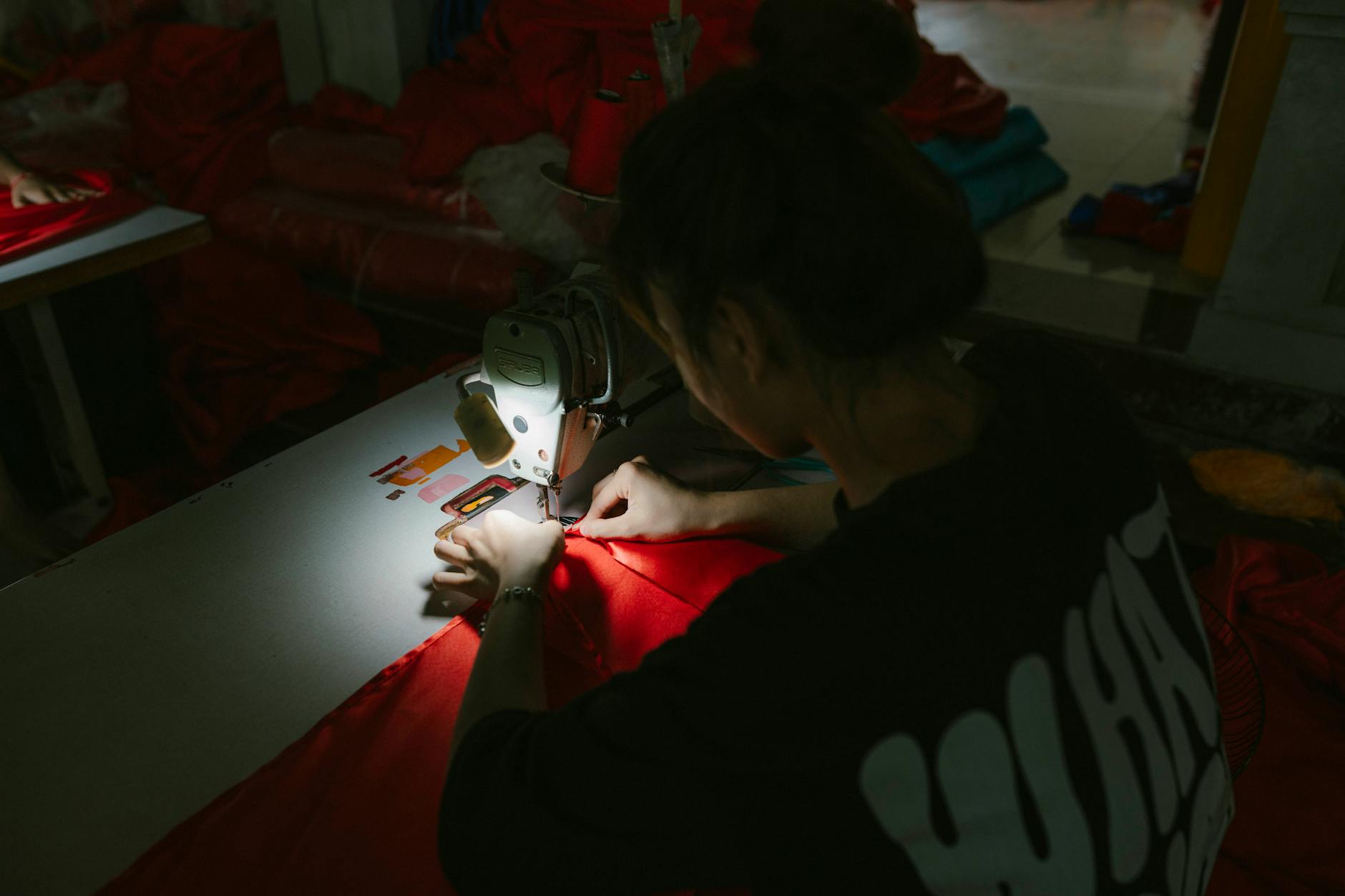 Industrial sewing machines in a fashion trade school workshop classroom
