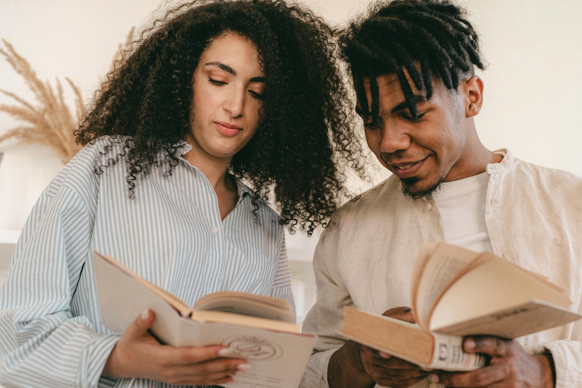 Customers browsing and reading books in a welcoming bookstore environment