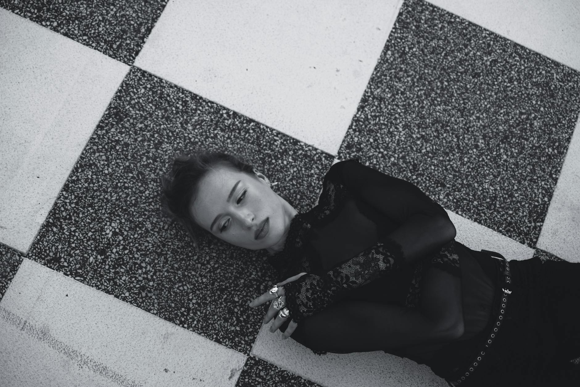 Stack of modern geometric rings showing angular design and brushed metal textures