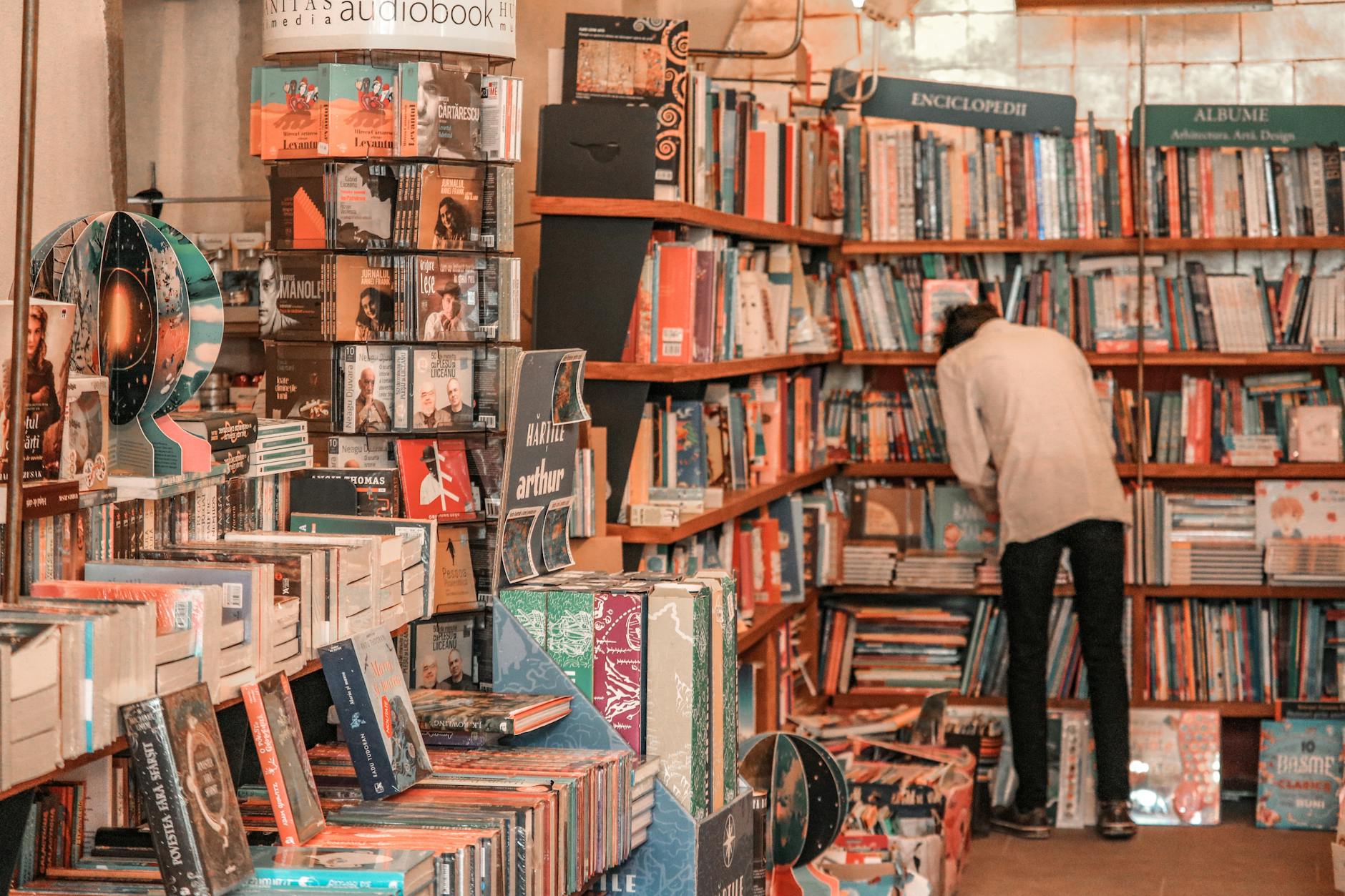 Bookstore shelves filled with various books showing the competitive publishing marketplace
