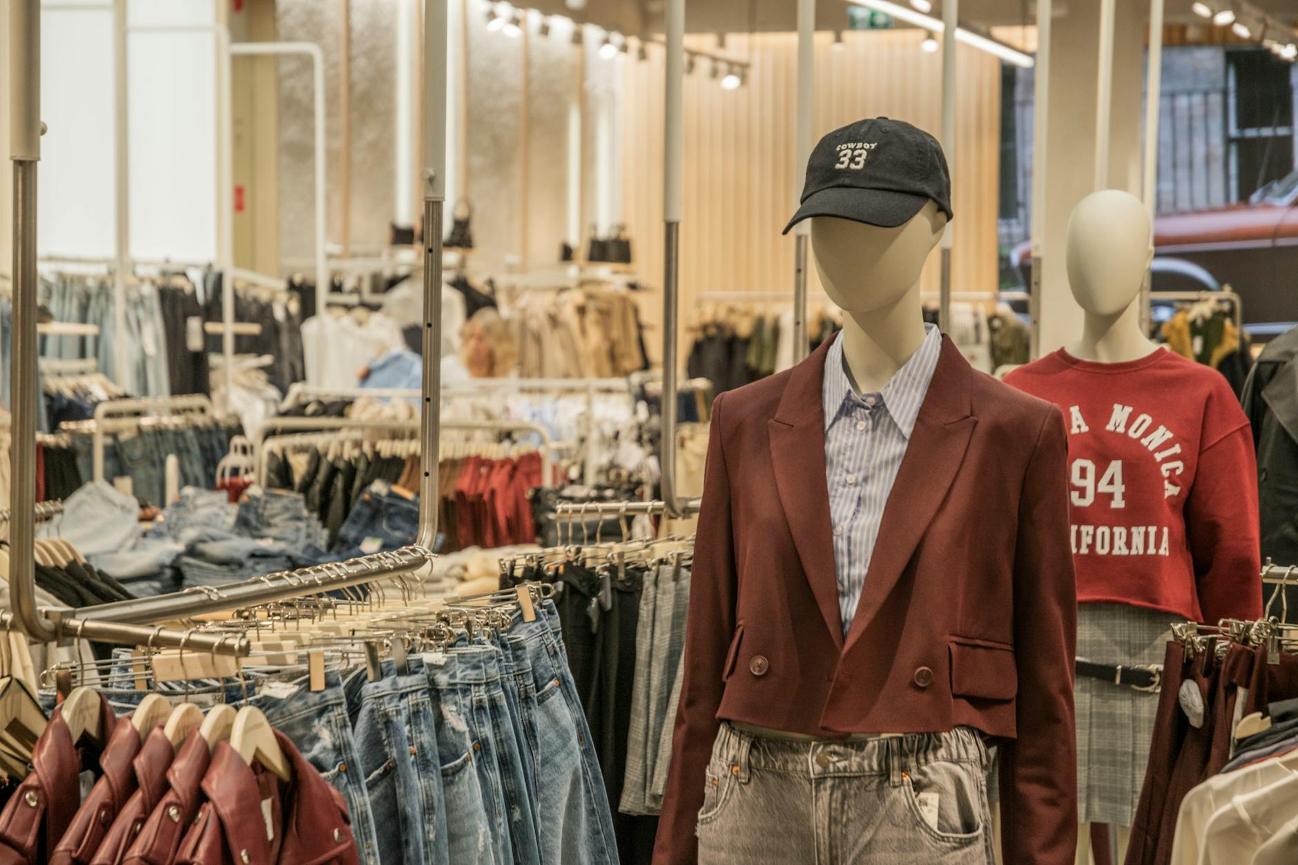 Clothing store interior with blazers and professional wear displayed