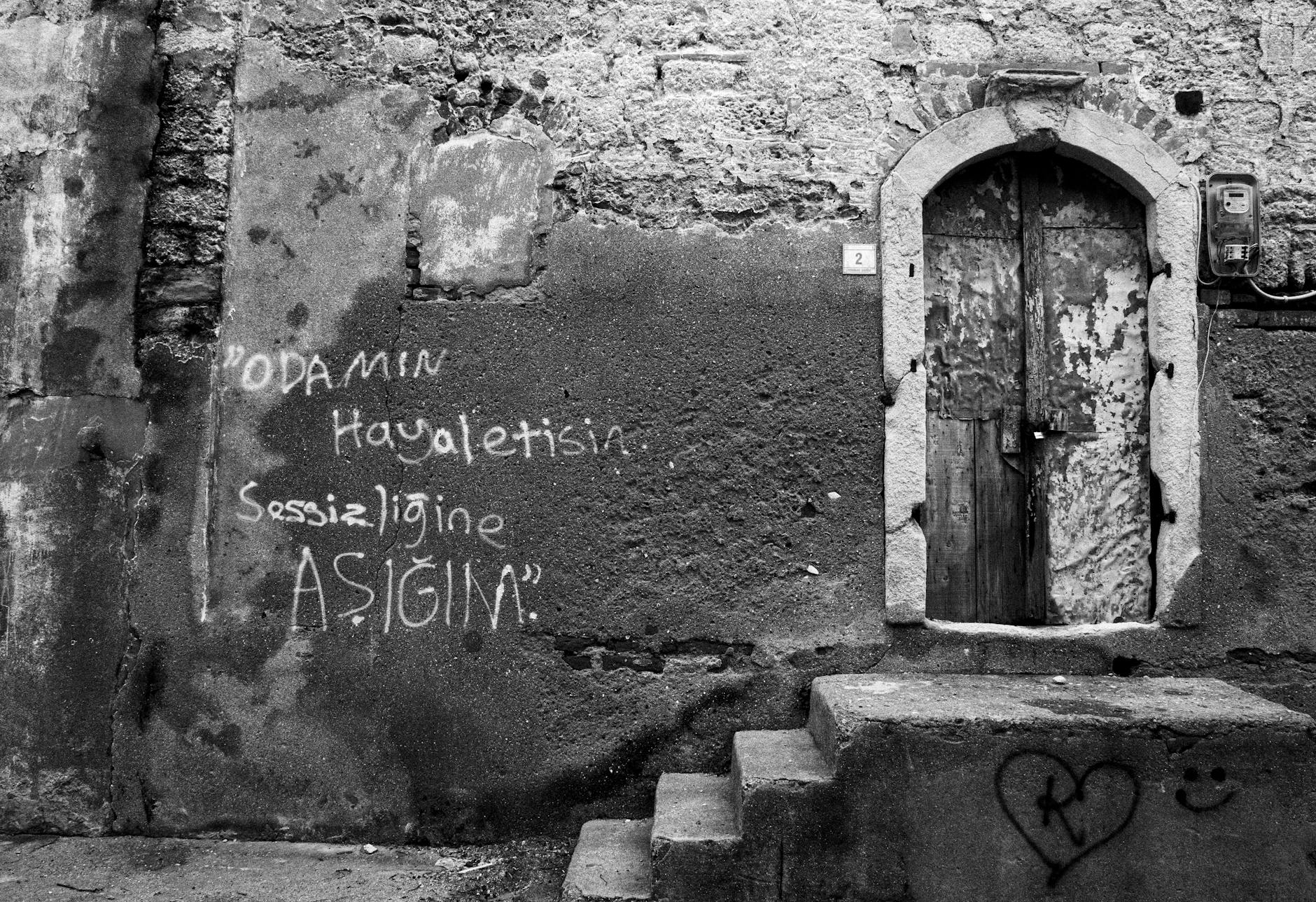 Minimalist clothing rack displaying neutral-toned garments in a contemporary retail space