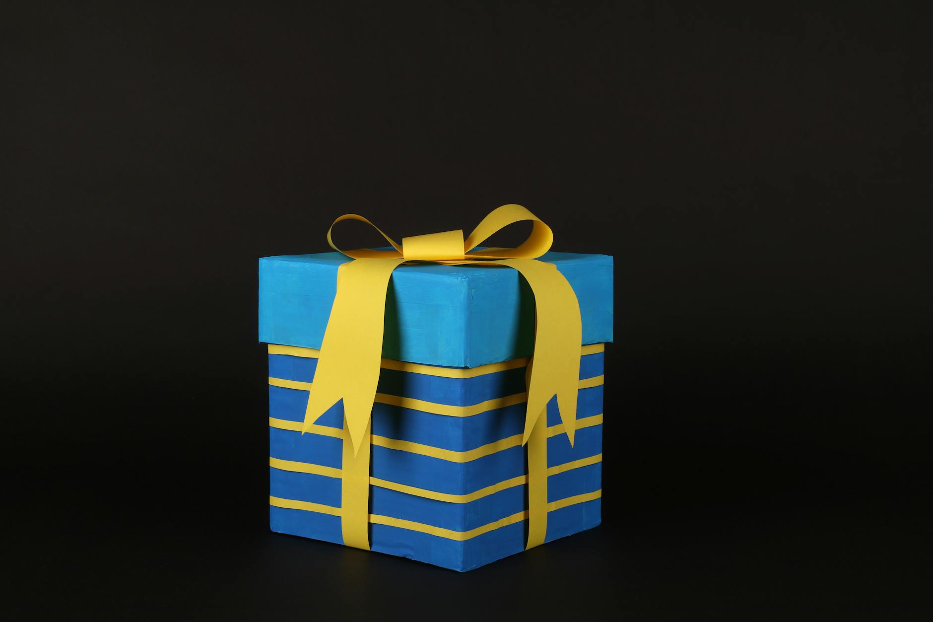 Holiday gift box representing retro gaming handhelds as popular seasonal presents