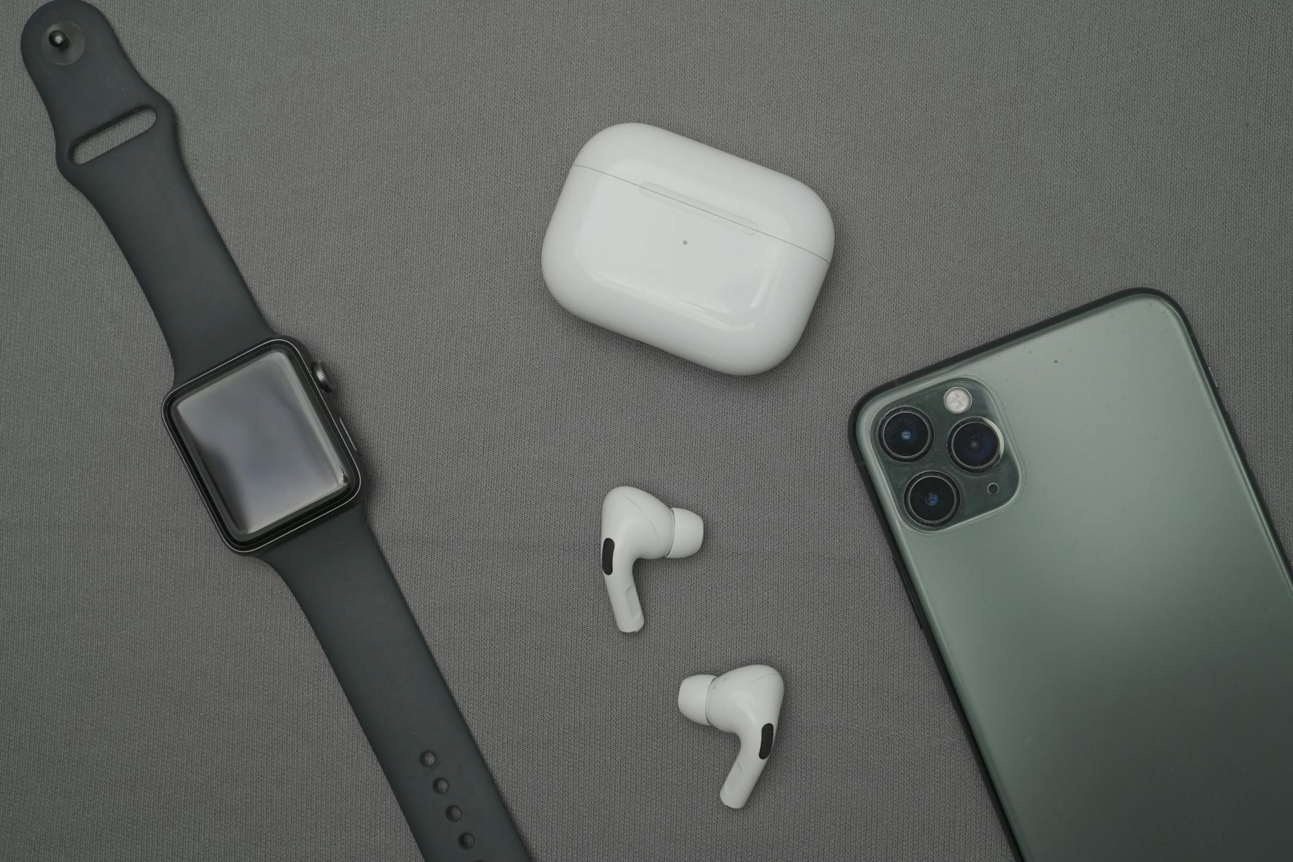 Modern electronic devices arranged on clean surface showing portability