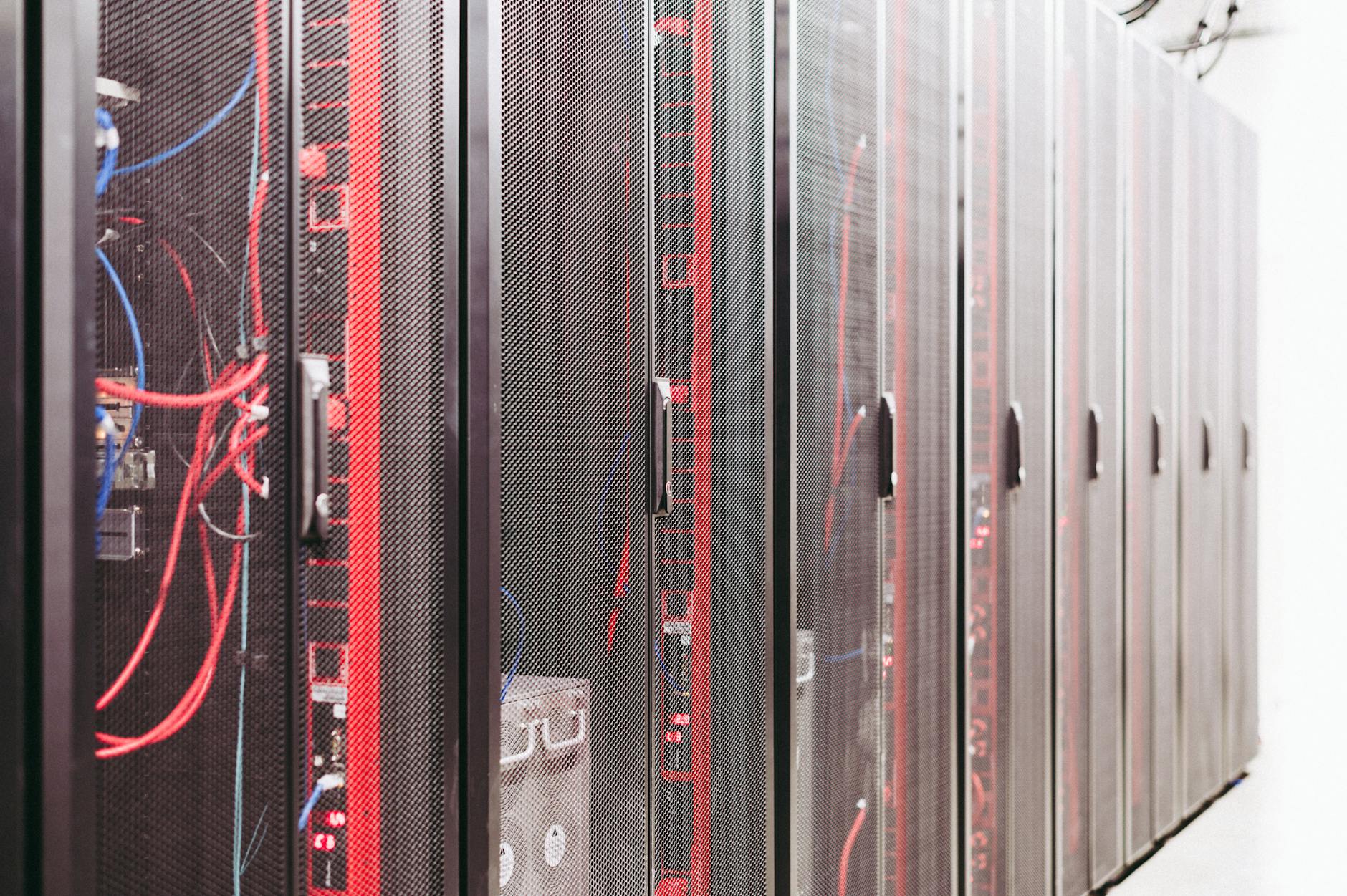 Server racks in modern data center facility with cooling systems