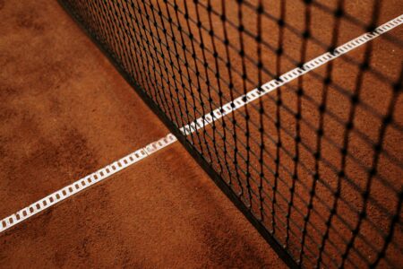 Historical tennis court representing 1880s elite sports culture
