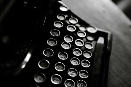 Vintage typewriter with paper showing creative writing process