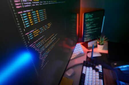 CFTC Deploys AI Trading Algorithms Against Crypto Market Cheats Computer screen displaying algorithmic trading patterns and data analysis