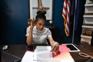 Stack of federal government policy documents on a desk