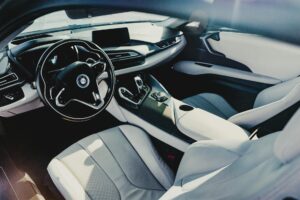 Modern luxury vehicle interior with leather seats and dashboard displays