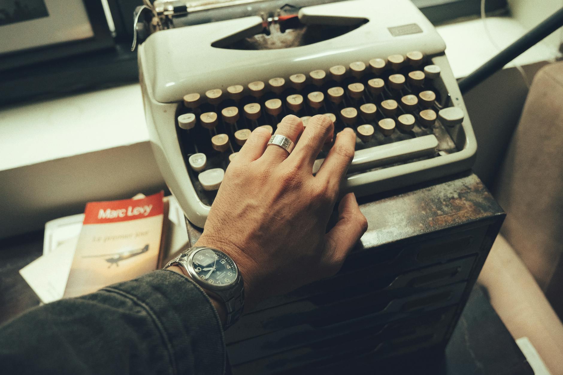 Clean writing desk with open notebook and pen
