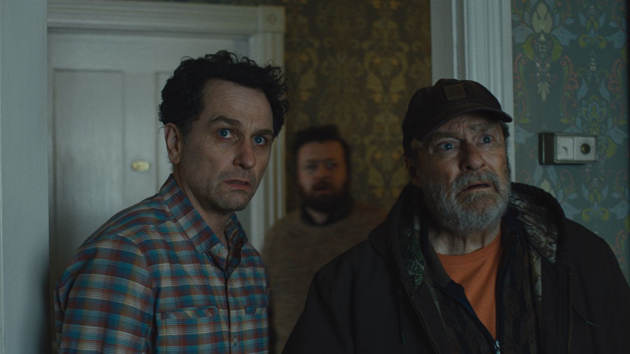 Foggy coastal town with mysterious atmosphere perfect for folk horror setting