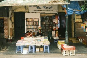 Bookstores Boom, Barker Gets Reread, and Anne Frank Turns 97 Shelves of books inside a warmly lit independent bookstore