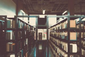 O. Henry, Lost Worlds, and the Poet Nobody Could Publish Rows of aged books on wooden library shelves with warm light