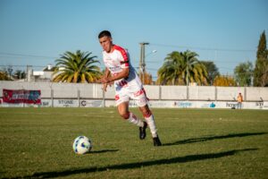 High-Speed Cameras, Boron Buckyballs, and Deciphered Scrolls Soccer player performing a dribbling maneuver on a grass field