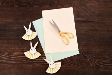 Paper Hedgehogs, Erotic Pages, and One Very Mortified Crafter Close-up of handmade paper folded into a small animal shape on a wooden table