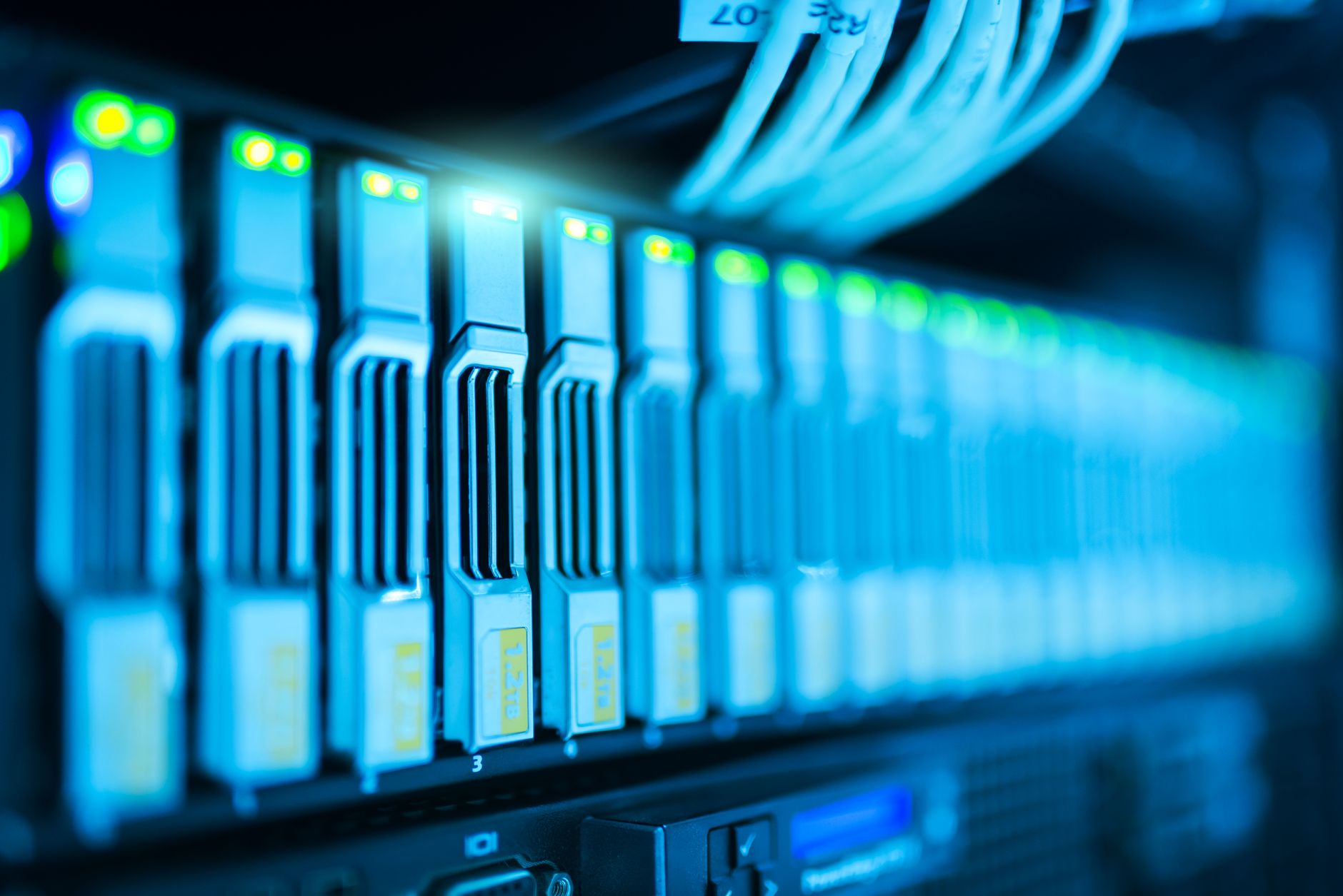 Rows of classical computer servers in a large data center facility