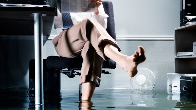 A Thousand Words a Day Inside a Submarine A writer working in a confined space with a notebook and pen