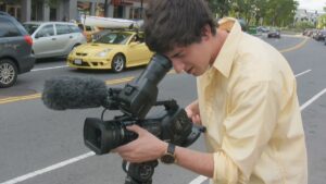 Ross McElwees New Film Turns a Sons Death Into Documentary A handheld documentary film camera resting on a table in dim light