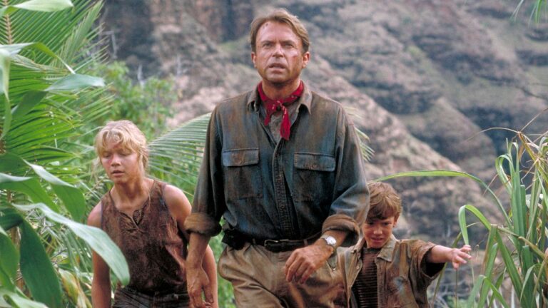 Sam Neill, 78, Mastered the Father Who Empty classic movie theater with red seats and dramatic lighting