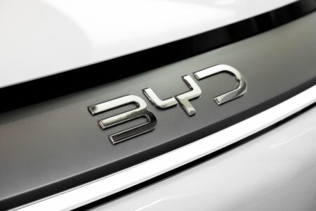 Close-up of a high-performance car's structural components showing organic geometric forms
