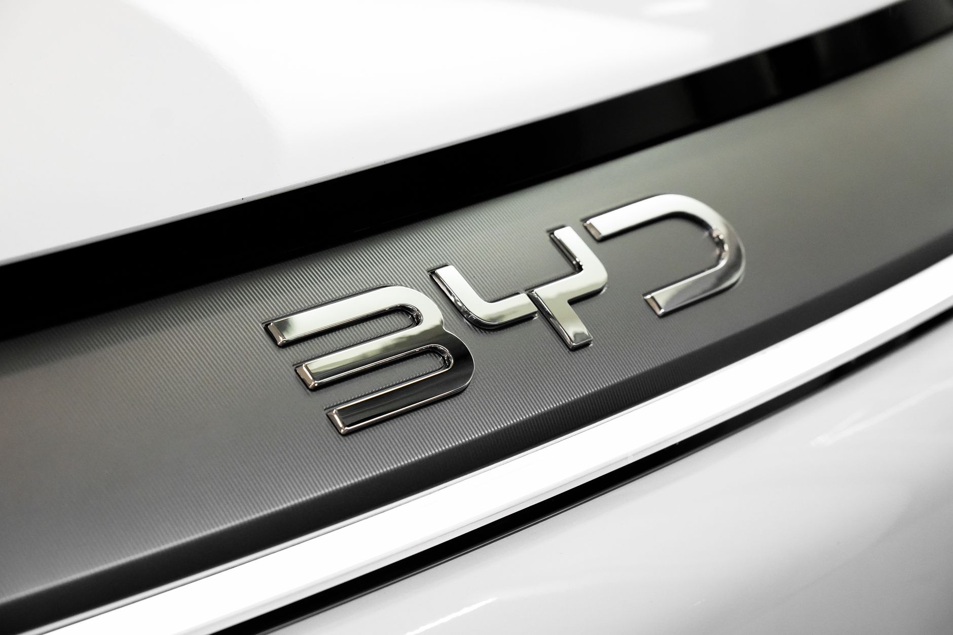 Close-up of a high-performance car's structural components showing organic geometric forms