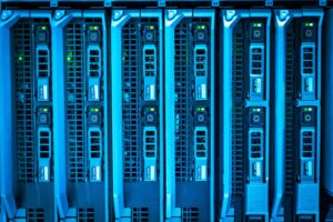 Rows of enterprise servers in a datacenter with blinking indicator lights