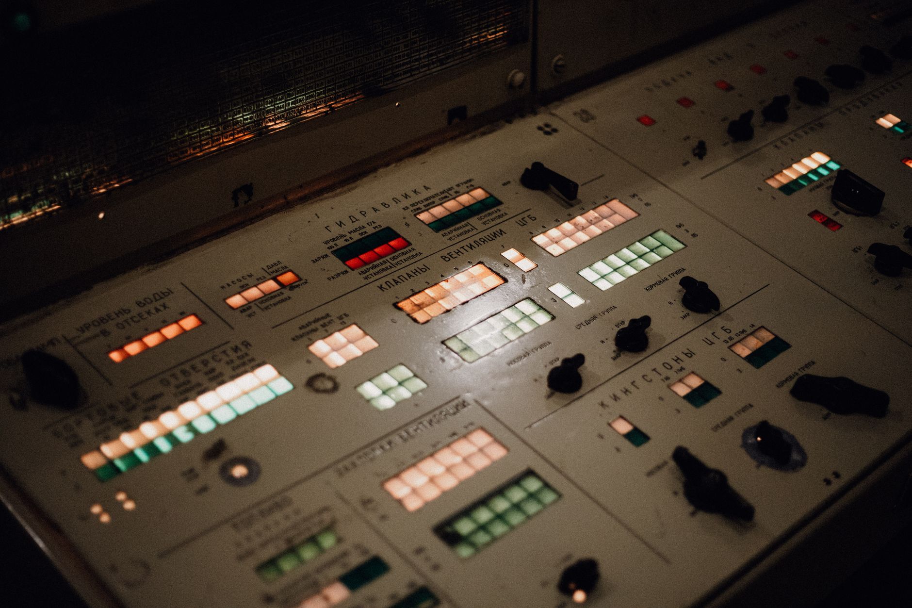 Engineers working at computer stations in a spacecraft operations control room