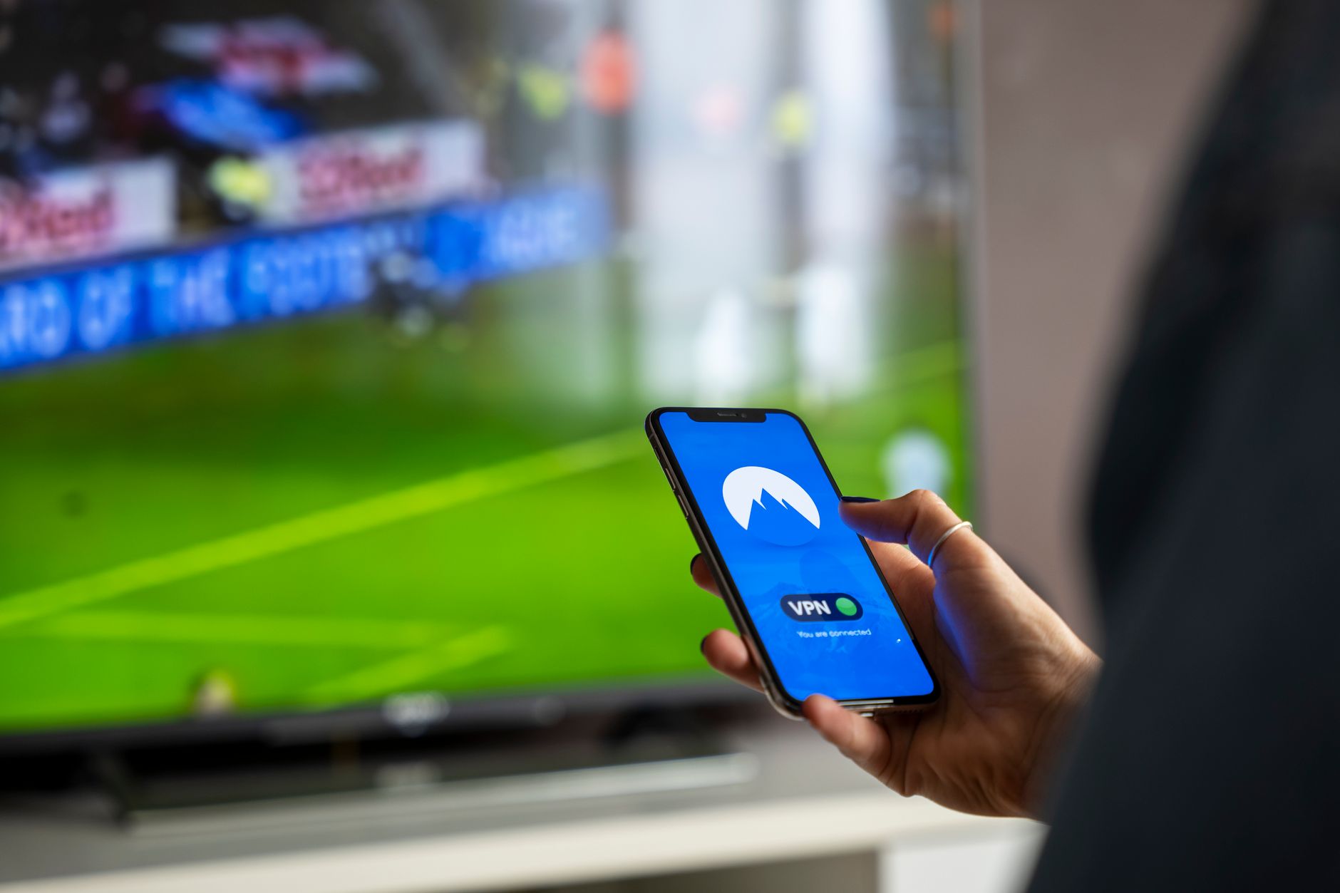 Person watching a streaming service on a large television screen at home