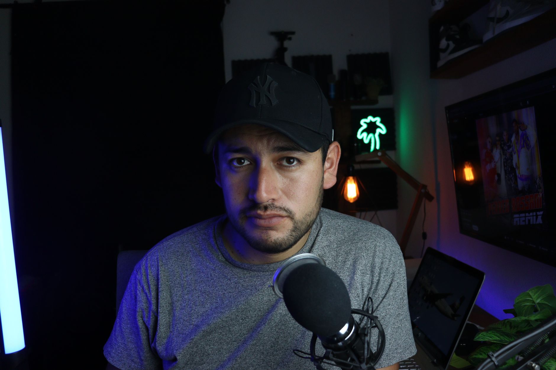 Person filming video content on a camera for online platform