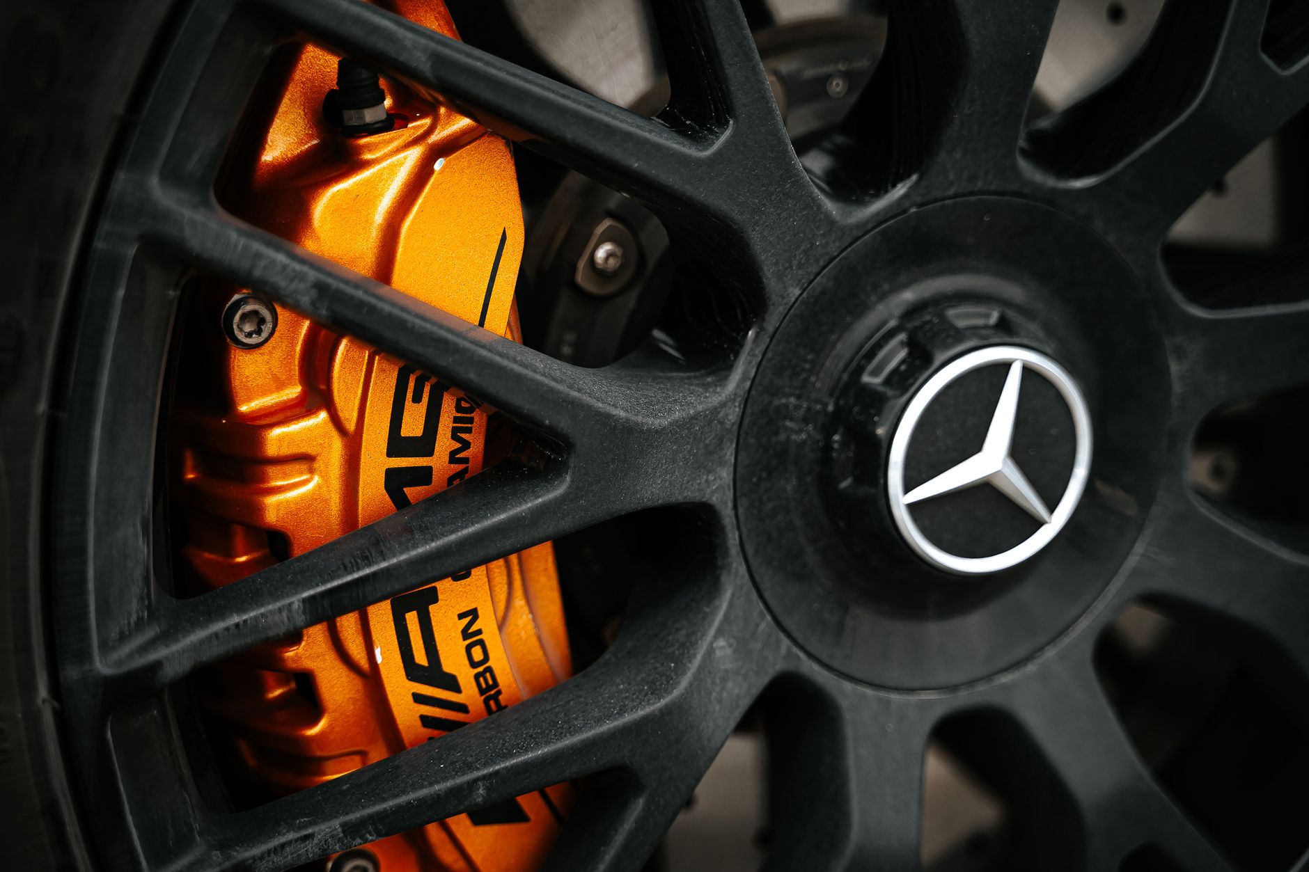 High-performance brake caliper assembly on a track-focused sports car