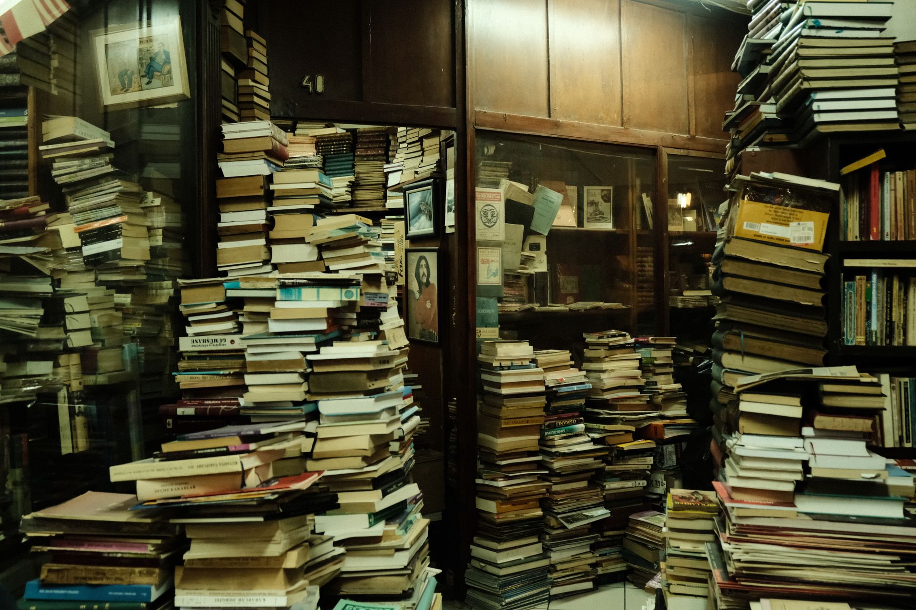 Interior of a small independent bookstore with crowded shelves