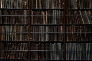 Black Writers at the Sorbonne and 14 Nonfiction Books Worth Your Time Rows of aged hardcover books on wooden library shelves