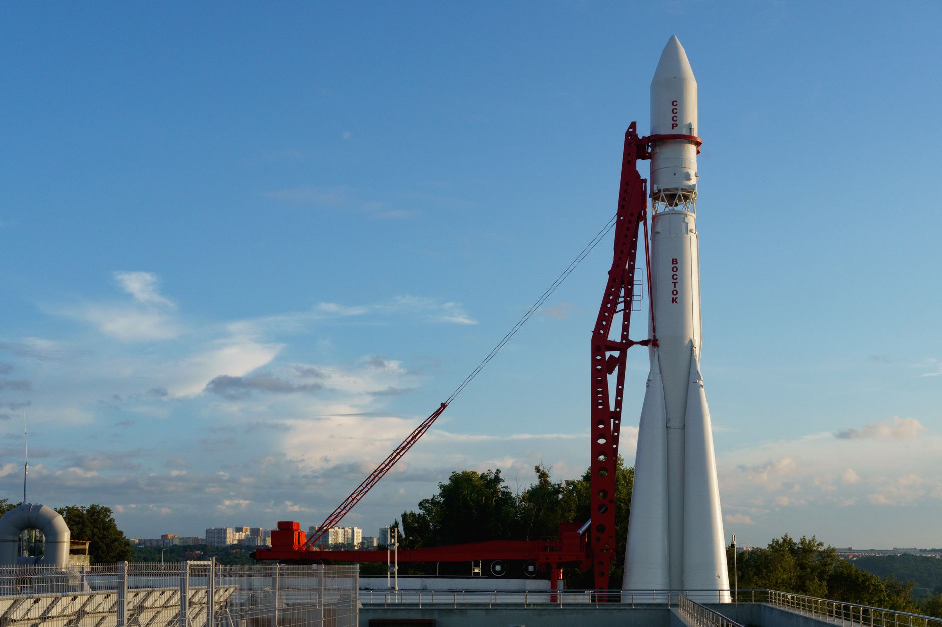 A rocket launching at night with bright exhaust illuminating the launch pad